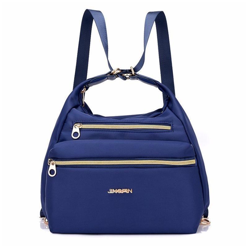 Bolso con doble cremalleras, también mochila y bandolera