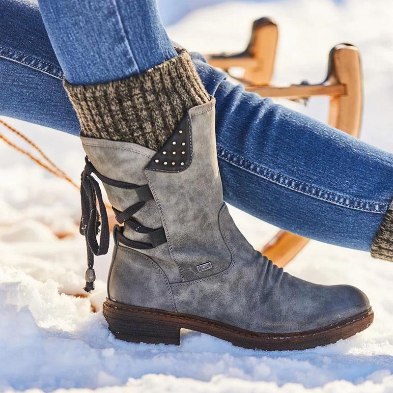 Botas de invierno con cordones en la espalda