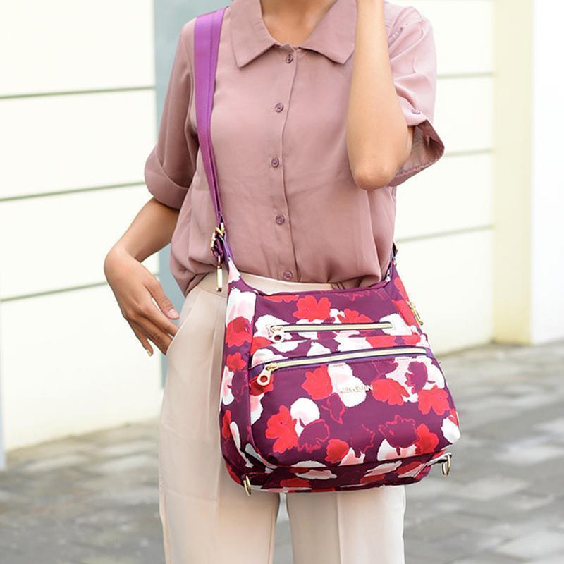 Bolso con doble cremalleras, también mochila y bandolera